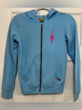 Aviator Nation Kids Light Blue Zip Hoodie with Pink Lightning Bolt